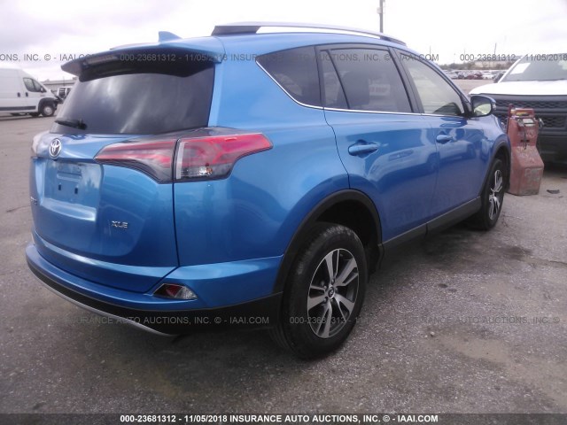 JTMWFREV9JJ728610 - 2018 TOYOTA RAV4 ADVENTURE/XLE BLUE photo 4