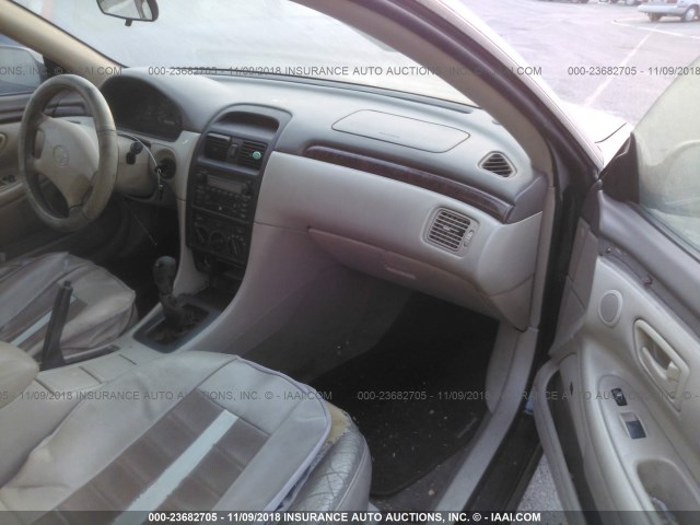 2T1CF22P71C525887 - 2001 TOYOTA CAMRY SOLARA SE/SLE შავი ფოტო 5