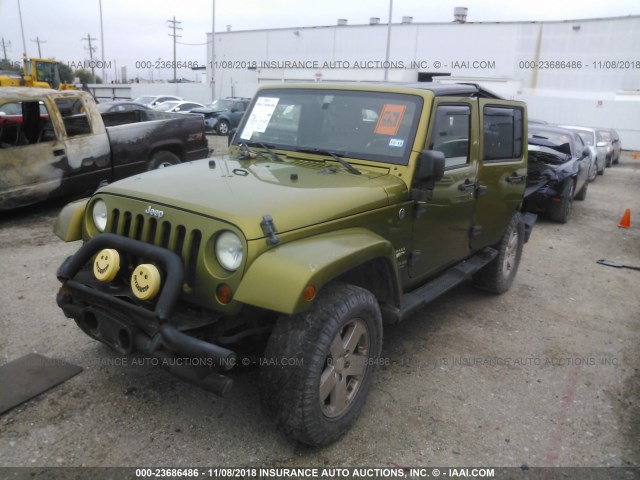 1J4GA59198L573620 - 2008 JEEP WRANGLER UNLIMITE SAHARA GREEN photo 2