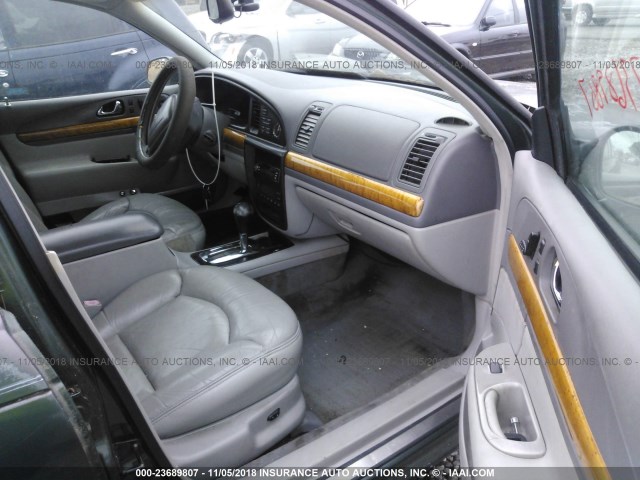 1LNFM97V9WY619335 - 1998 LINCOLN CONTINENTAL  绿色 照片 5