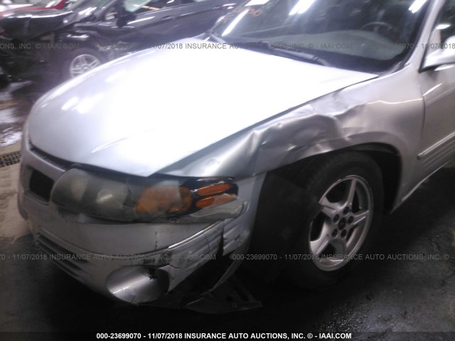 1G2HX54K314242416 - 2001 PONTIAC BONNEVILLE SE SILVER photo 6