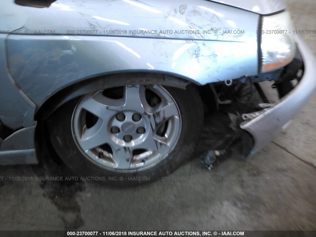 1G8JU54F43Y568238 - 2003 SATURN L200 Light Blue photo 6