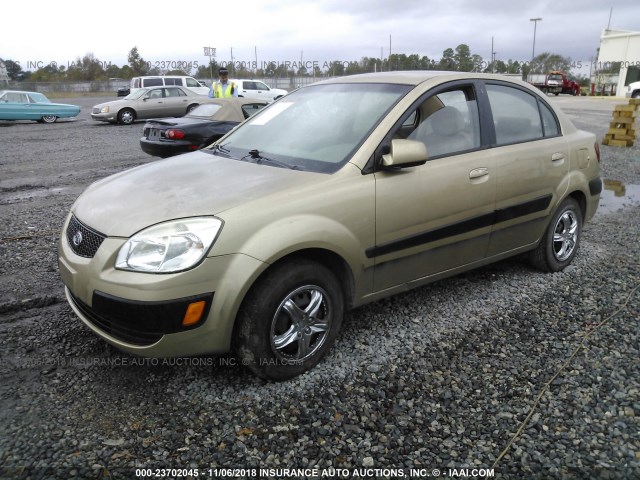 KNADE223X96444144 - 2009 KIA RIO LX/SX GOLD photo 2