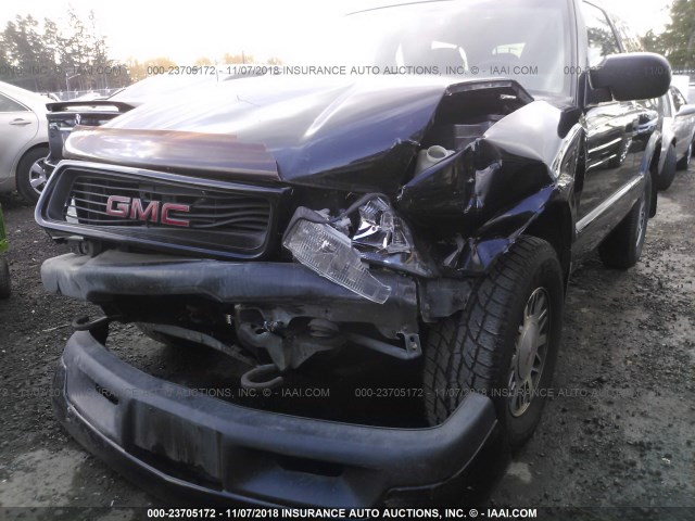 1GKCT18W3XK515323 - 1999 GMC JIMMY BLACK photo 6