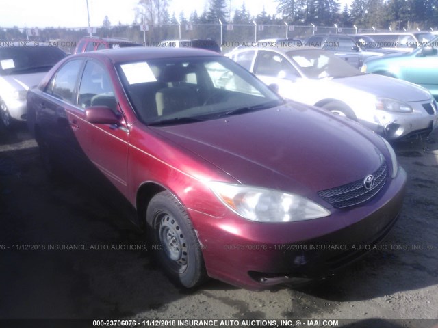 JTDBE32KX20019572 - 2002 TOYOTA CAMRY LE/XLE/SE RED photo 1