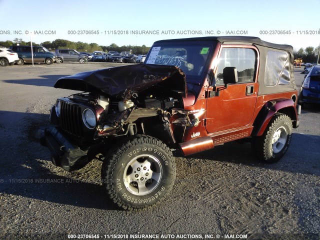 1J4FA59S51P352700 - 2001 JEEP WRANGLER / TJ SAHARA MAROON photo 6