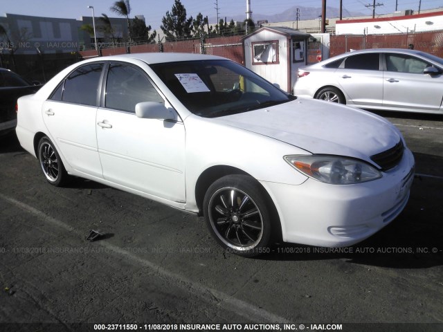 4T1BE32K03U208124 - 2003 TOYOTA CAMRY LE/XLE/SE WHITE photo 1