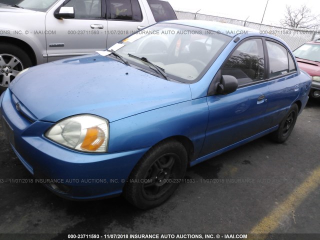 KNADC125036241515 - 2003 KIA RIO BLUE photo 2