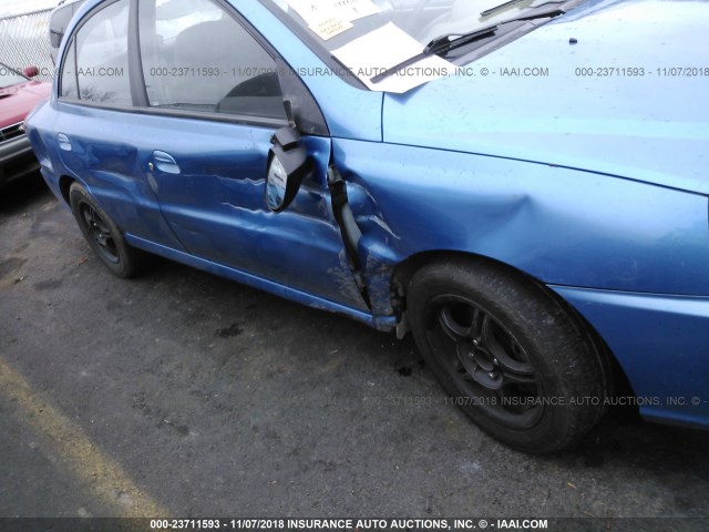 KNADC125036241515 - 2003 KIA RIO BLUE photo 6