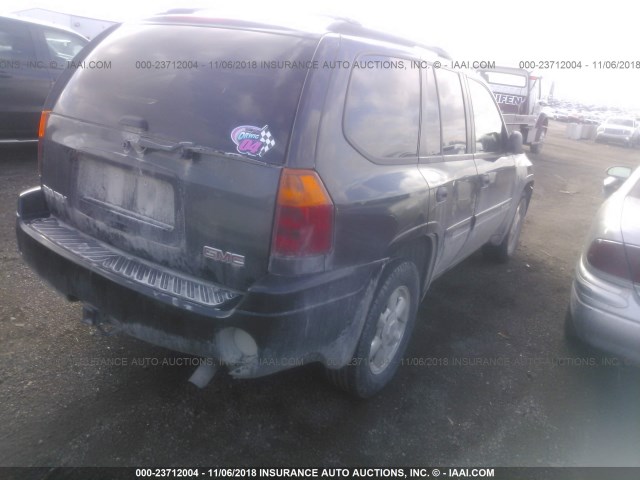 1GKDT13S642113672 - 2004 GMC ENVOY BLACK photo 4