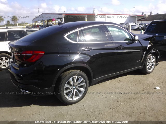 5UXKU0C56J0G69672 - 2018 BMW X6 SDRIVE35I BLACK photo 4