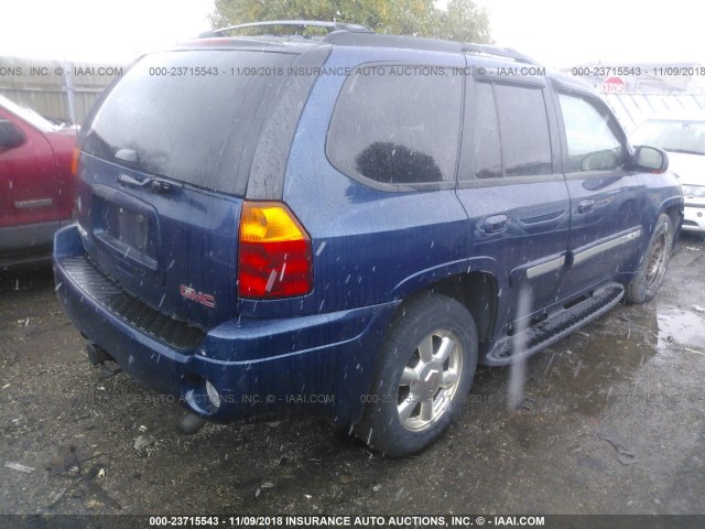 1GKDT13S522127253 - 2002 GMC ENVOY BLUE photo 4