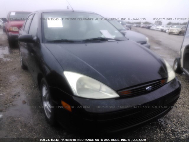 1FAFP34P5YW380143 - 2000 FORD FOCUS SE/SE COMFORT BLACK photo 1