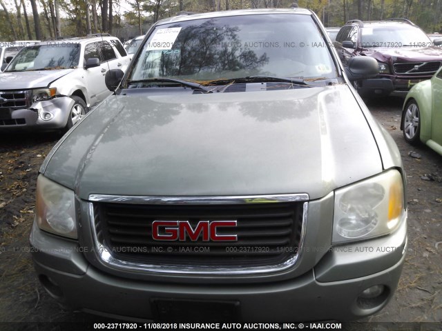 1GKDS13S342319485 - 2004 GMC ENVOY GREEN photo 6