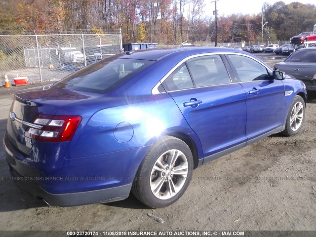 1FAHP2E8XFG141270 - 2015 FORD TAURUS SEL BLUE photo 4