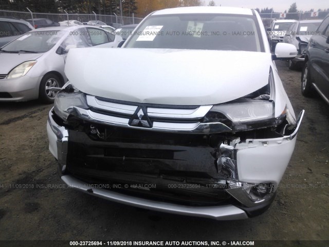 JA4AD3A38GZ013422 - 2016 MITSUBISHI OUTLANDER SE/SEL WHITE photo 6