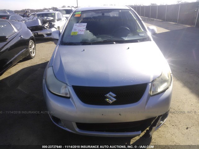 JS2YC5A2XB6303395 - 2011 SUZUKI SX4 LE SILVER photo 6