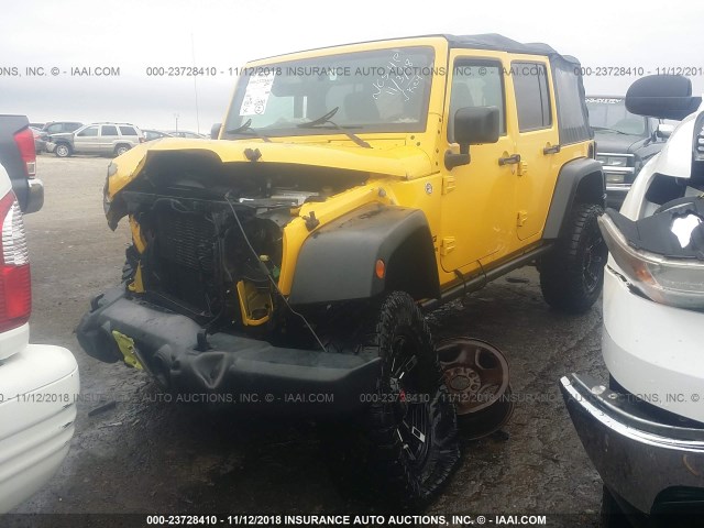 1C4BJWDG7FL698968 - 2015 JEEP WRANGLER UNLIMITE SPORT YELLOW photo 2