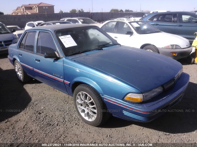 1G2JB54H3R7551320 - 1994 PONTIAC SUNBIRD LE BLUE photo 1