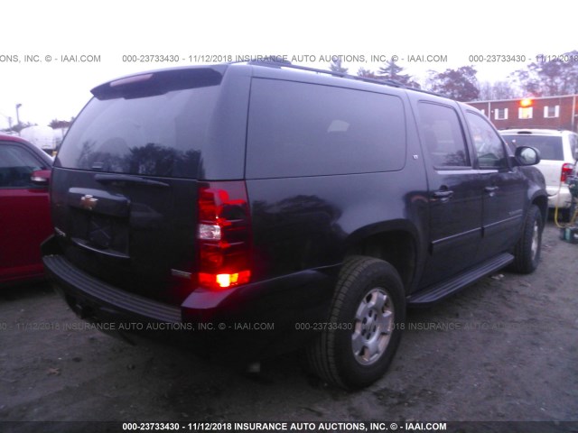 1GNSKJE39BR320192 - 2011 CHEVROLET SUBURBAN K1500 LT BLACK photo 4