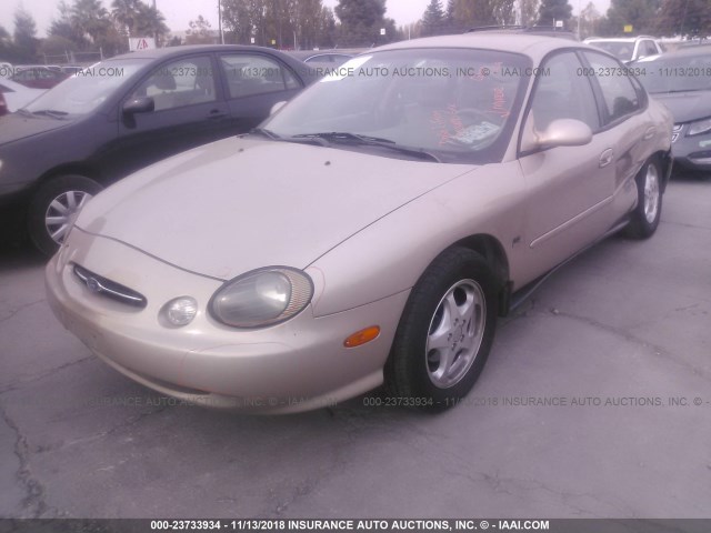 1FAFP53S7XG319130 - 1999 FORD TAURUS SE/COMFORT/SPORT GOLD photo 2