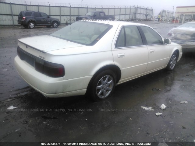 1G6KY5496XU922530 - 1999 CADILLAC SEVILLE STS WHITE photo 4