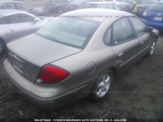 1FAFP55U52A167729 - 2002 FORD TAURUS SES TAN photo 4