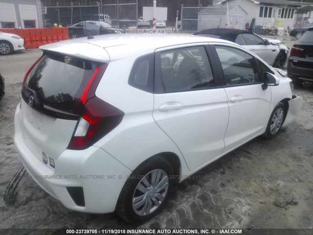 JHMGK5H50GX019749 - 2016 HONDA FIT LX WHITE photo 4