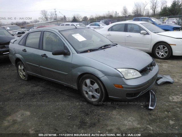 1FAFP34N95W315807 - 2005 FORD FOCUS ZX4 GREEN photo 1