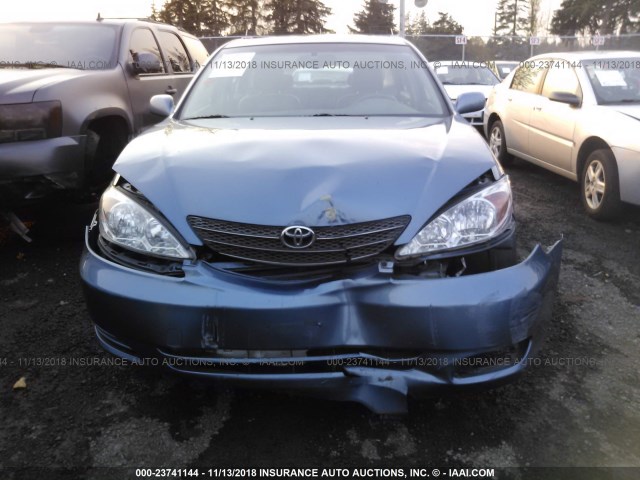 JTDBE32K120084083 - 2002 TOYOTA CAMRY LE/XLE/SE BLUE photo 6