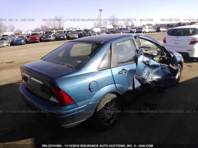 1FAFP3834YW121232 - 2000 FORD FOCUS ZTS BLUE photo 4