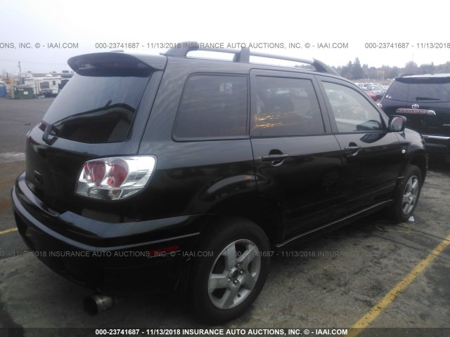 JA4LX41G93U038071 - 2003 MITSUBISHI OUTLANDER XLS BLACK photo 4