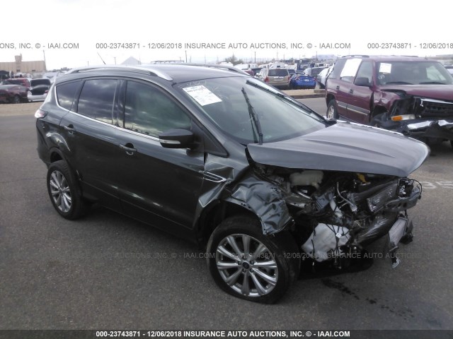 1FMCU0J98HUE09457 - 2017 FORD ESCAPE TITANIUM BLACK photo 1