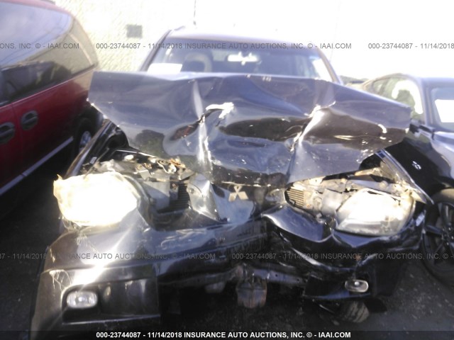 JA4LZ41F06U001805 - 2006 MITSUBISHI OUTLANDER SE შავი ფოტო 6