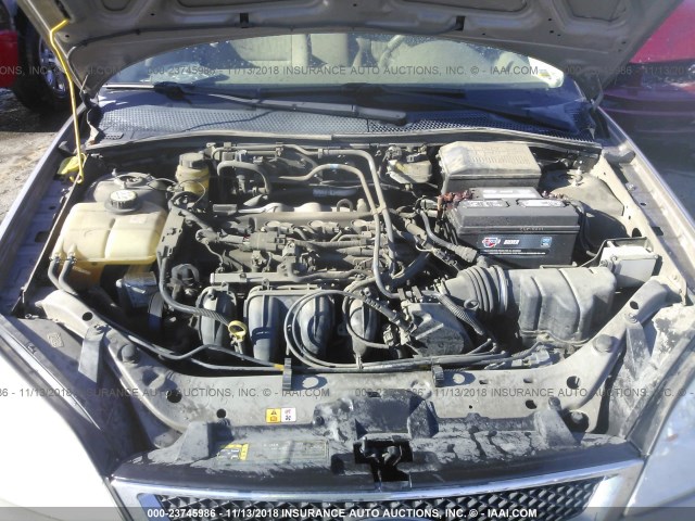 1FAFP34N95W302555 - 2005 FORD FOCUS ZX4 GOLD photo 10
