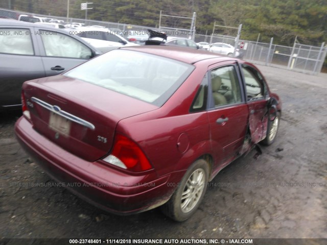 1FAHP3839YW426217 - 2000 FORD FOCUS ZTS RED photo 4