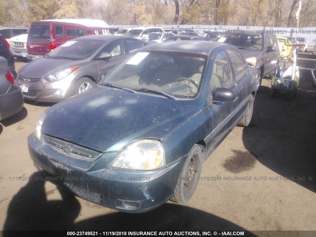 KNADC125346288166 - 2004 KIA RIO GREEN photo 2