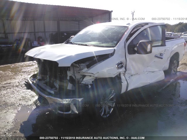 1N6AA1C63HN569928 - 2017 NISSAN TITAN SV WHITE photo 2