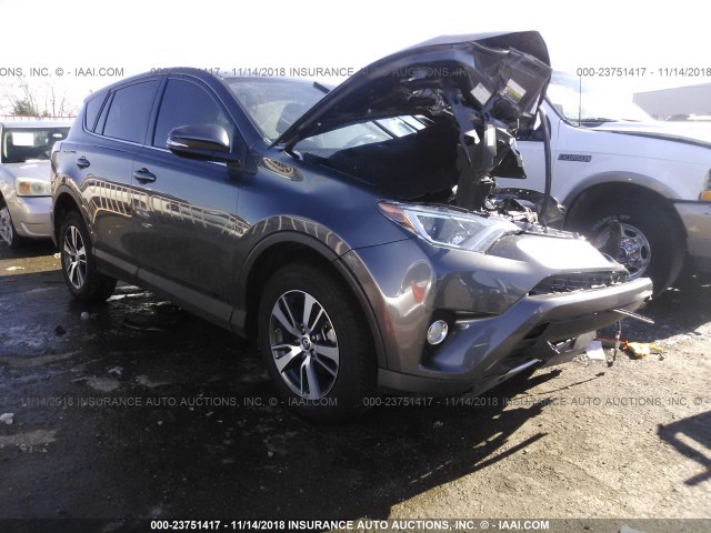 2T3RFREV6JW703985 - 2018 TOYOTA RAV4 ADVENTURE/XLE GRAY photo 1