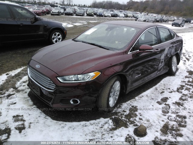 3FA6P0LU6FR117844 - 2015 FORD FUSION SE HYBRID ORANGE photo 2