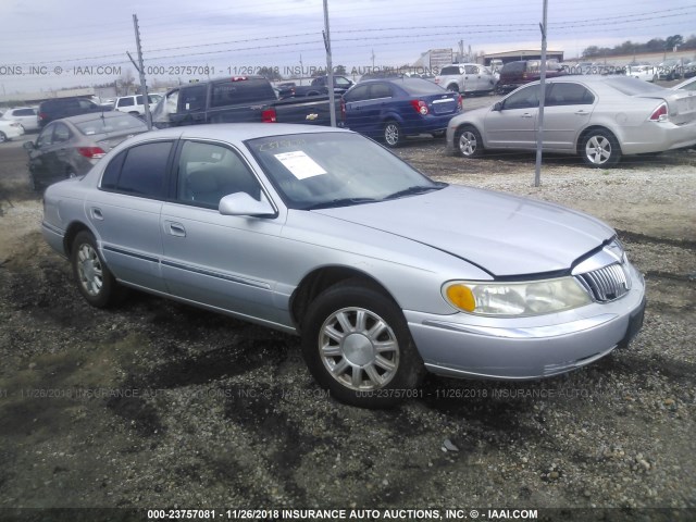 1LNHM97V81Y711490 - 2001 LINCOLN CONTINENTAL  GRAY photo 1