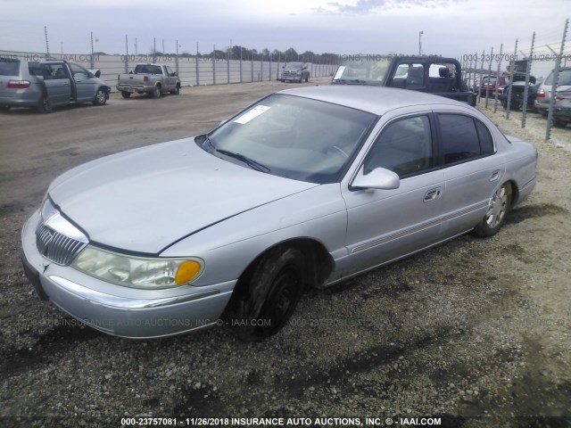 1LNHM97V81Y711490 - 2001 LINCOLN CONTINENTAL  GRAY photo 2