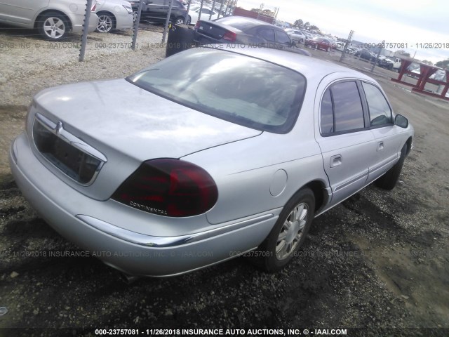 1LNHM97V81Y711490 - 2001 LINCOLN CONTINENTAL  GRAY photo 4