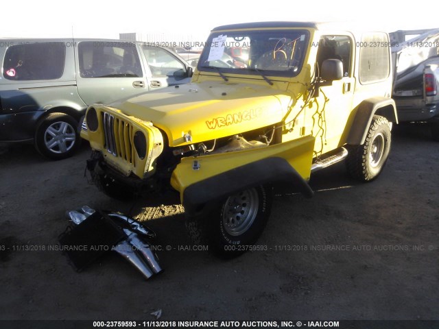 1J4FA39SX4P747819 - 2004 JEEP WRANGLER X YELLOW photo 2