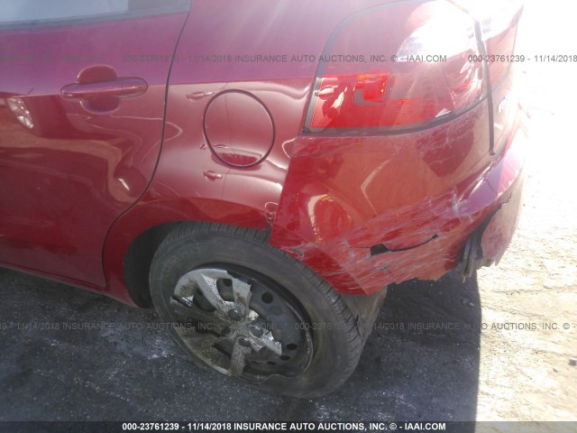 KNADM5A38C6038604 - 2012 KIA RIO LX RED photo 6