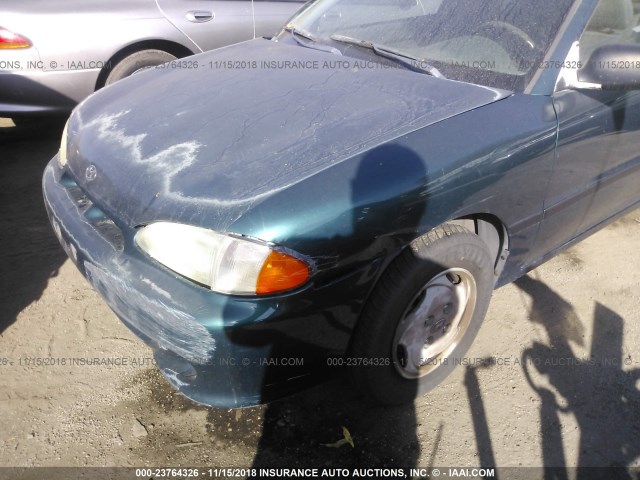 KMHVD34N0VU239870 - 1997 HYUNDAI ACCENT GS/GT GREEN photo 6