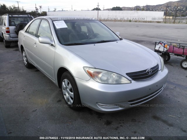 4T1BE32K23U718345 - 2003 TOYOTA CAMRY LE/XLE/SE SILVER photo 1