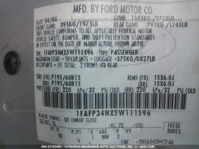 1FAFP34NX5W111596 - 2005 FORD FOCUS ZX4 SILVER photo 9