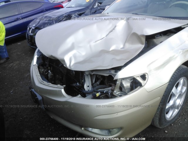 2T1CF28P62C595907 - 2002 TOYOTA CAMRY SOLARA SE/SLE BROWN photo 6