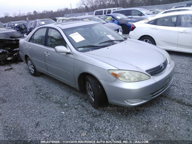 4T1BE32K03U774977 - 2003 TOYOTA CAMRY LE/XLE/SE SILVER photo 1